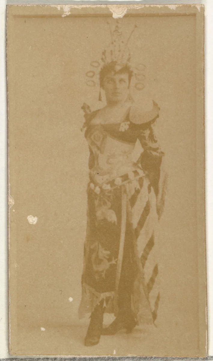 [Actress wearing tall headpiece], from the Actors and Actresses series (N145-8) issued by Duke Sons & Co. to promote Duke Cigarettes by W. Duke, Sons & Co., photograph, 1890-1895