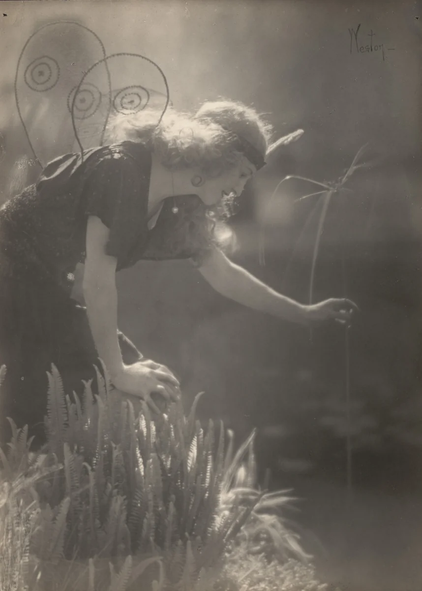 Violet Romer. (reaching for tall reed, wearing fairy costume) by Edward Weston, photograph, 1917
