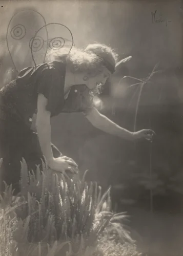 Violet Romer. (reaching for tall reed, wearing fairy costume) by Edward Weston, photograph, 1917
