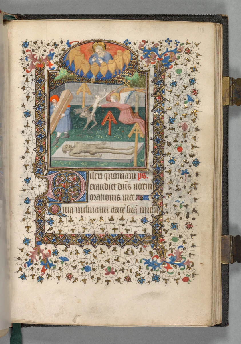 Book of Hours (Use of Paris): Fol. 118r, Angel and Devil Fighting over a Soul by The Bedford Master, book, 1415-1425