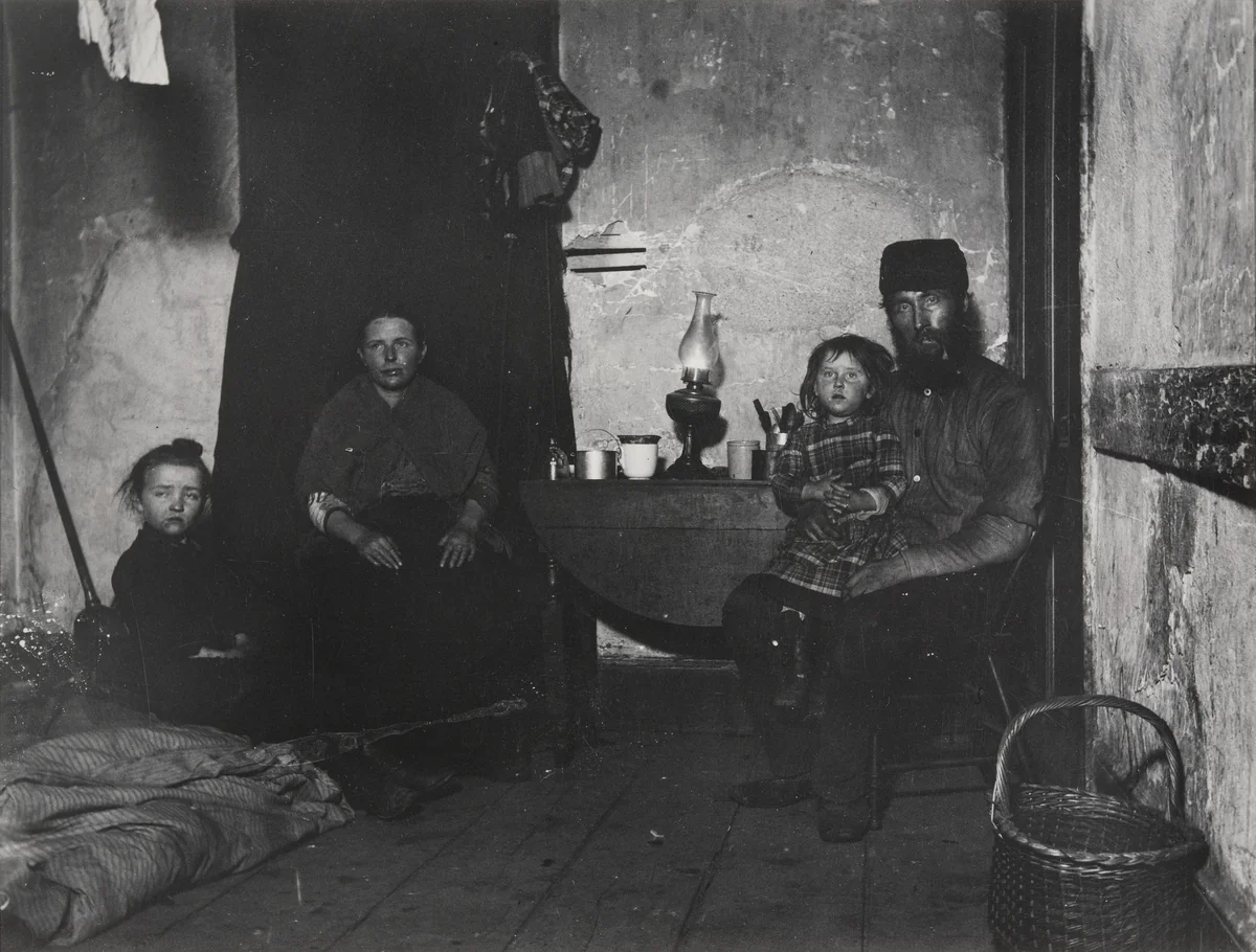 In Poverty Gap, West 28th Street: An English Coal-heaver's Home by Jacob August Riis, photograph, 1889