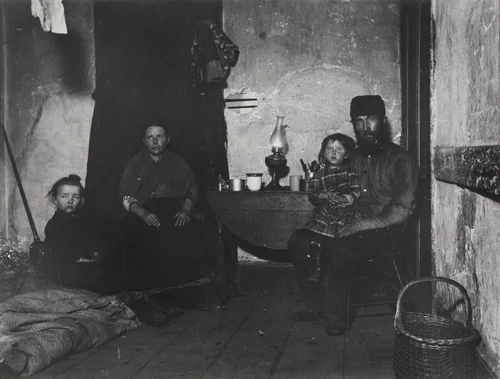 In Poverty Gap, West 28th Street: An English Coal-heaver's Home by Jacob August Riis, photograph, 1889