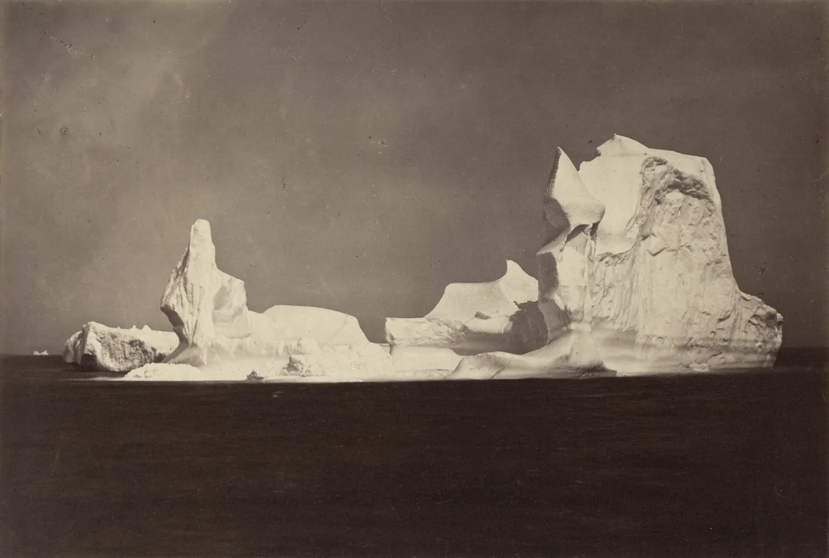 "This View shows the beautiful forms in varied shapes which the Berg assumed. On this Berg we found a Lake of Fresh Water, covering an acre in extent." by George P. Critcherson, John L. Dunmore, William Bradford, photograph, 1869