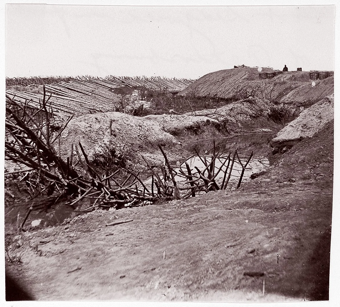 [Ditch and Chevaux-de-frise, Fort Sedgwick, in Front of Petersburg, Virginia] by Timothy O'Sullivan, photograph, 1865