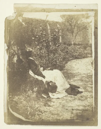 Mrs. Craik Reclining in Garden with Hat and Book by Benjamin Mulock, photograph, 1848-1860