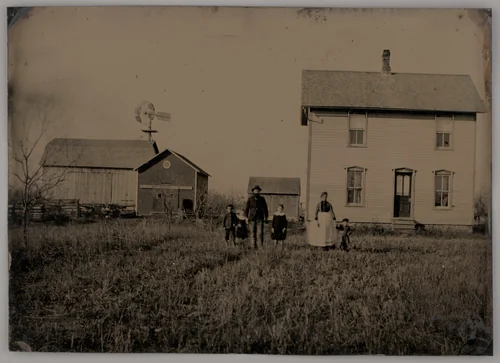 Untitled (A Man, a Woman, and Three Children Standing in Front of a Farmhouse) by Unknown maker, photograph, 1875