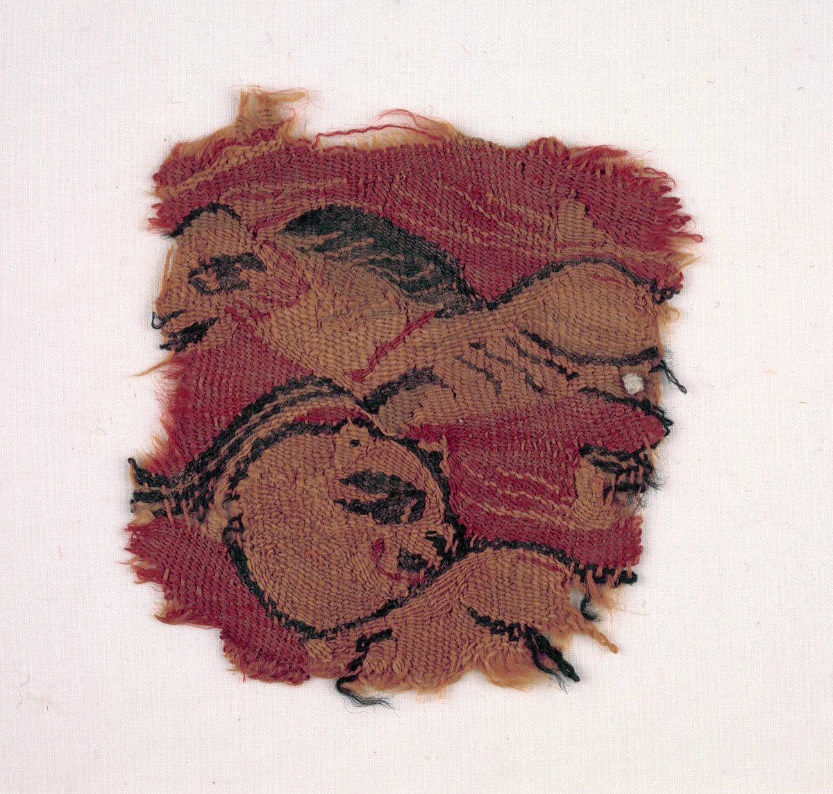 Fragment with Two Animals (?) by Unknown, textile, 580-599