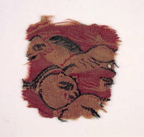 Fragment with Two Animals (?) by Unknown, textile, 580-599