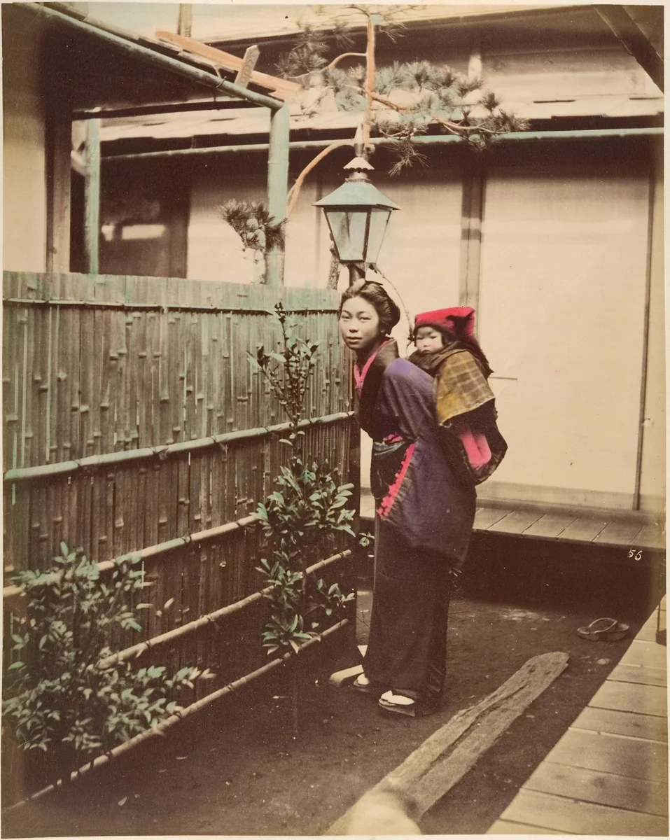 [Japanese Woman in Traditional Dress Posing with a Child on her Back] by Suzuki Shin'ichi, photograph, 1870-1879