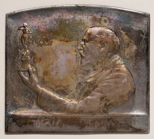 Medal portraying Delacour by Victor David Brenner, metalwork, 1899