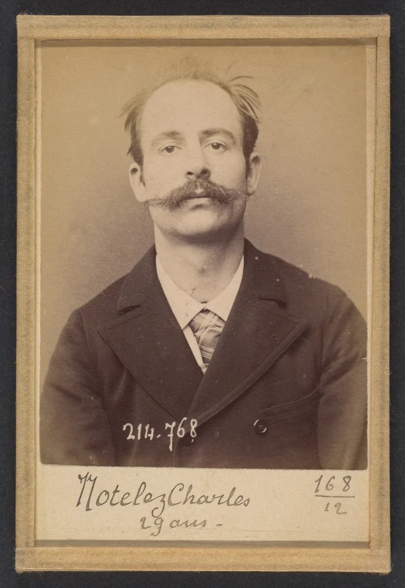 Notelez. Charles, Émile. 29 ans, né à Paris XXe. Portefeuilliste. Anarchiste. 26/2/94. by Alphonse Bertillon, photograph, 1894