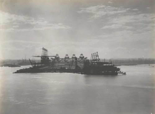 Cristobal coaling Station, showing commencement of erection of wharf bunker and viaduct system across end wharf by Unidentified Photographer, photograph, 1916