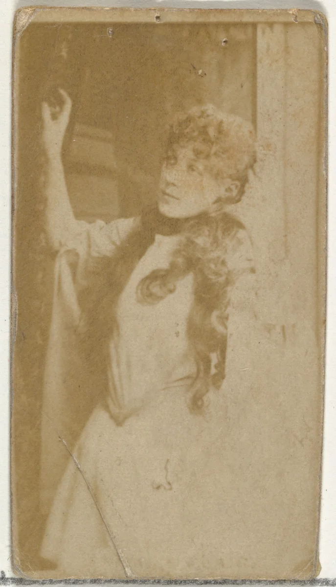 [Actress standing in doorway], from the Actors and Actresses series (N145-8) issued by Duke Sons & Co. to promote Duke Cigarettes by W. Duke, Sons & Co., photograph, 1890-1895