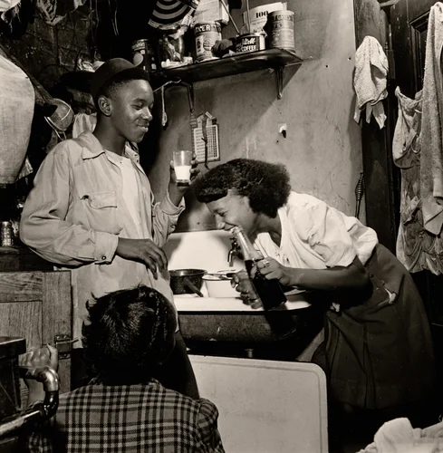 Three Teenagers in Kitchenette Apartment, Chicago, Illinois by Wayne Miller, photograph, 1946