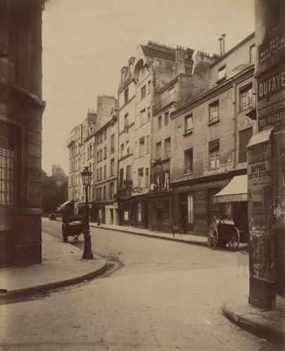 Les Maisons de la rue Boutebrie (nos pairs) vue de la rue des Pretres-Saint-Séverin by Eugène Atget, photograph, 1912