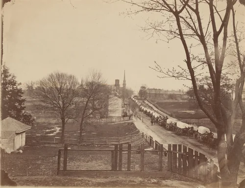 Train of Army Wagons Entering Petersburg, Virginia by John Reekie, photograph, 1865
