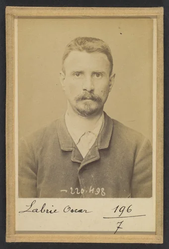 Labrie. Oscar, Alexandre. 33 ans, né à Charenton (Seine). Marchand de vins. Anarchiste. 2/7/94. by Alphonse Bertillon, photograph, 1894