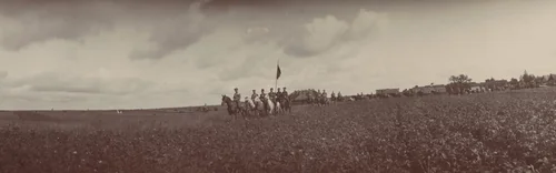 Emperor Nicholas II Followed Directly by Five Men on Horseback, with Flag, Ropsha by Unidentified Photographer, photograph, 1907