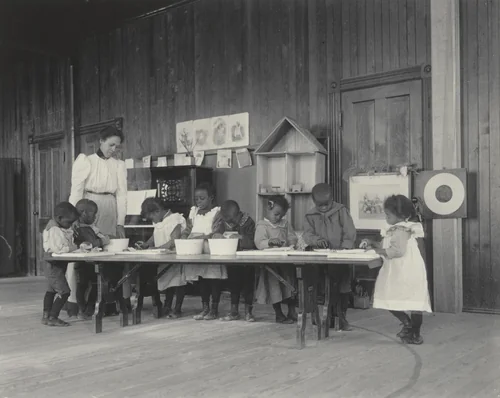 Kindergarten children washing and ironing by Frances Benjamin Johnston, photograph, 1899