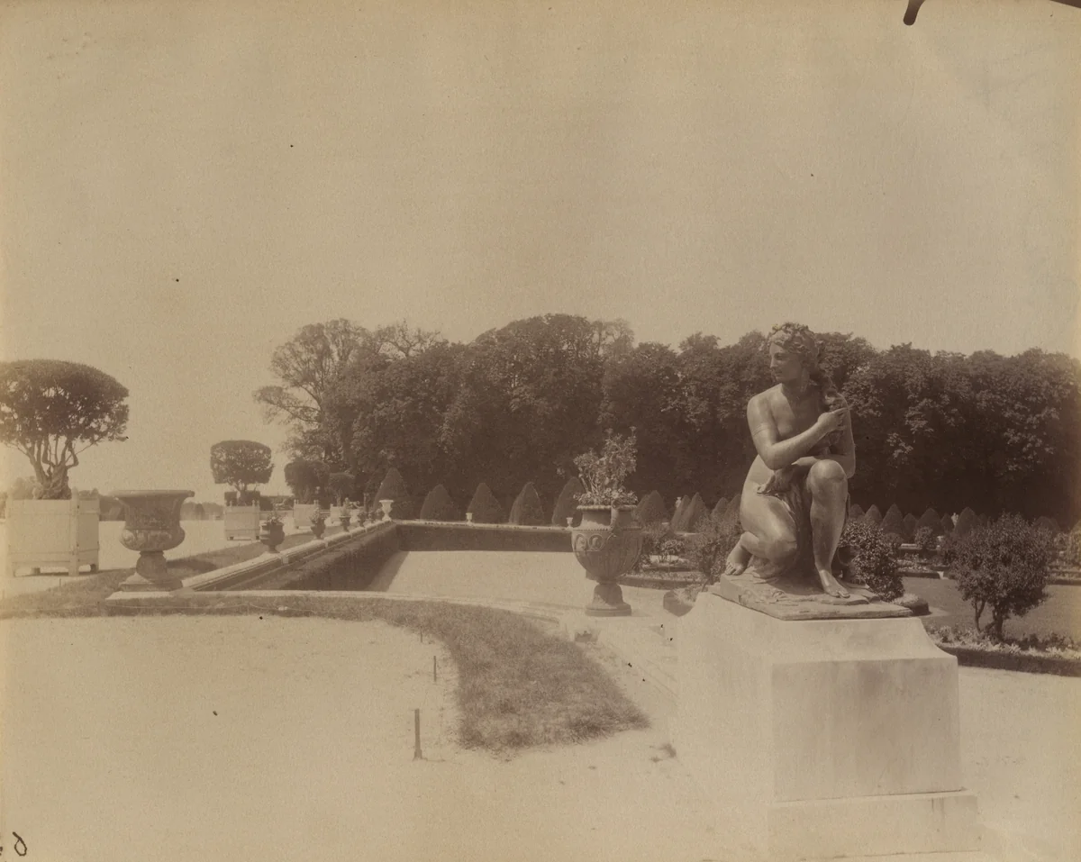 Versailles -- Venus Accroupie par Coysevox by Eugène Atget, photograph, 1902
