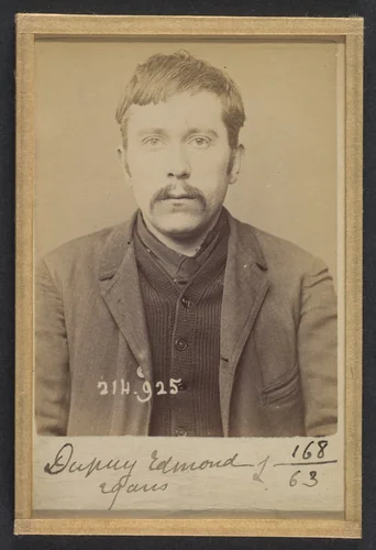 Dupuy. Edmond, Adolphe. 29 ans, né à Paris XIVe. Employé de commerce. Anarchiste. 1/3/94. by Alphonse Bertillon, photograph, 1894