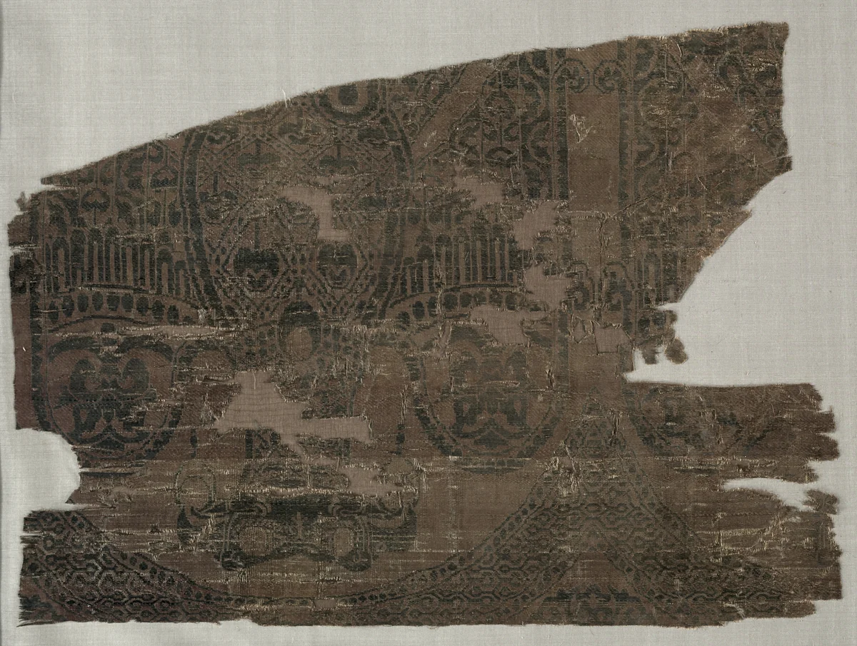 Samite fragments with double-headed eagles, from the tomb of Saint Bernard Calvo by Unknown, textile, 1200-1243