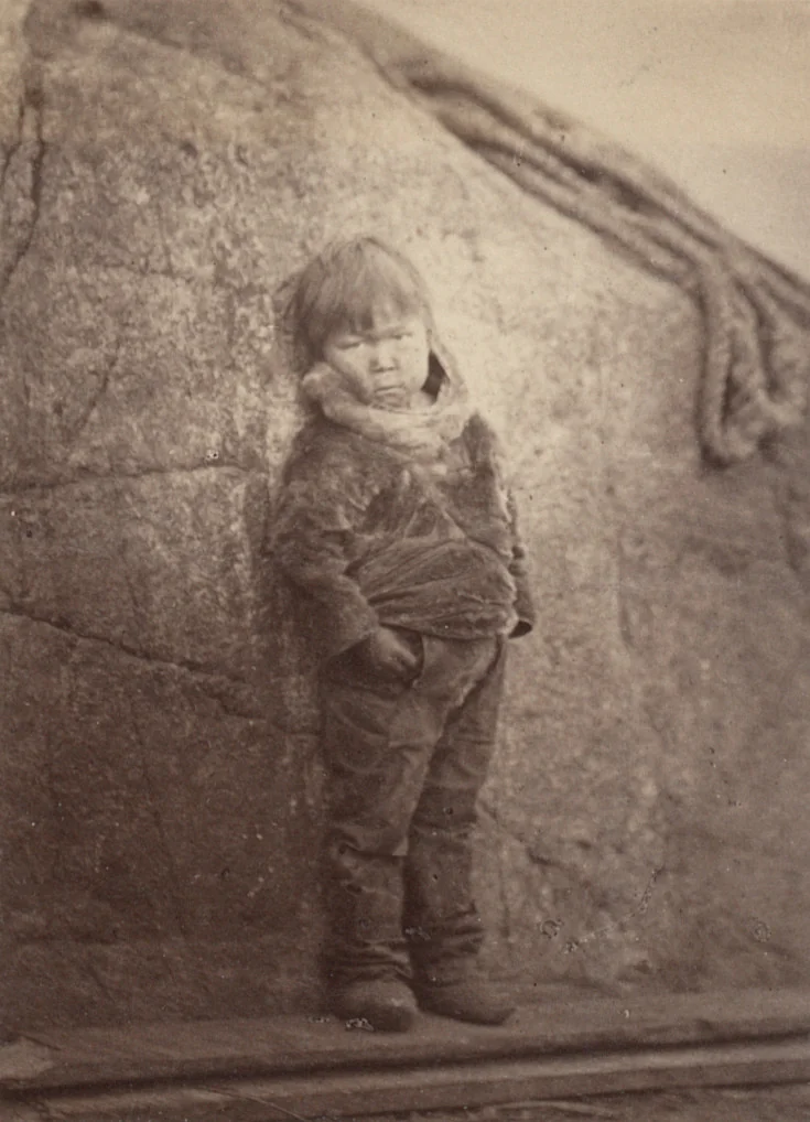 "An Esquimaux pet, a boy about eight years old" by George P. Critcherson, John L. Dunmore, William Bradford, photograph, 1869