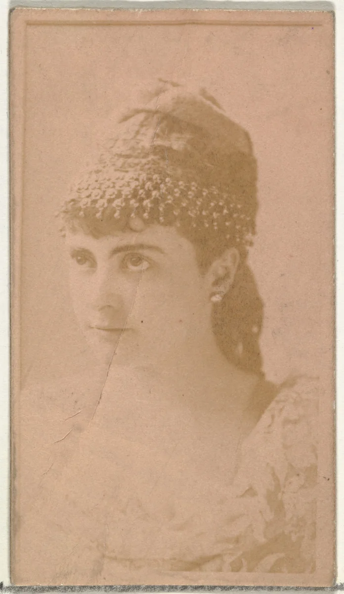 [Actress wearing ornate cap], from the Actors and Actresses series (N145-8) issued by Duke Sons & Co. to promote Duke Cigarettes by W. Duke, Sons & Co., photograph, 1890-1895