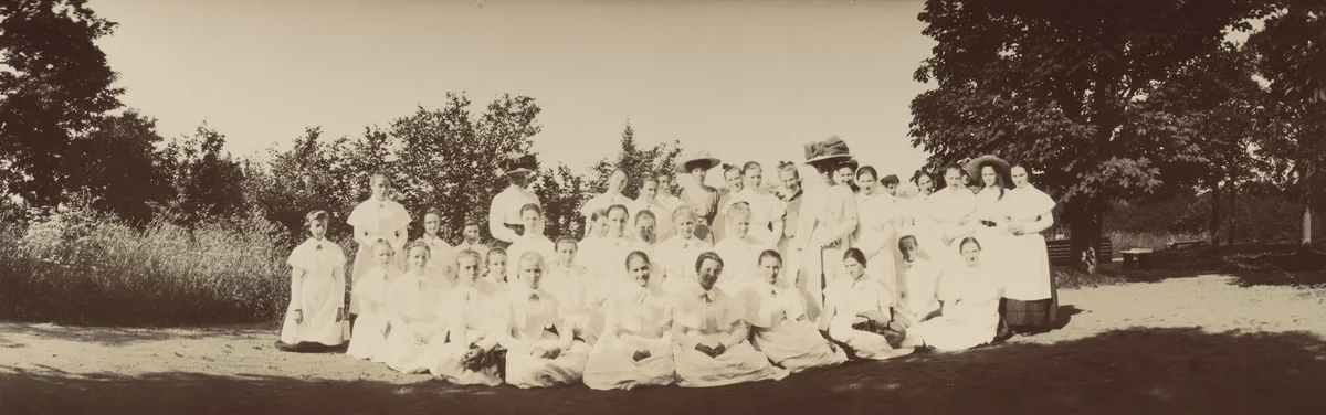 Grand Duchesses Olga and Xenia Alexandrovna in Hats Among Students of the Institute for Girls of Gentle Birth, Oranienbaum by Unidentified Photographer, photograph, 1909