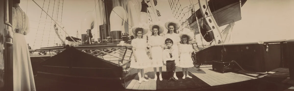 Grand Duchesses Maria, Tatiana, Olga, Anastasia, and Tsarevich Alexis Standing in Front of His Sisters, on Deck by Unidentified Photographer, photograph, 1908
