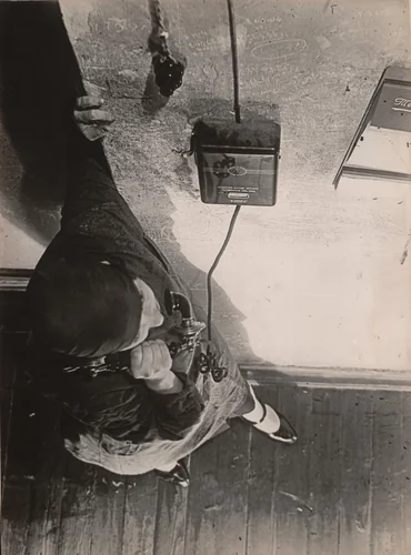 At the Telephone by Aleksandr Rodchenko, photograph, 1928