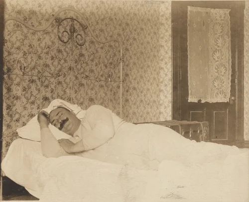 Untitled (Man with mustache sleeping) by American 20th Century, photograph, 1900-1910