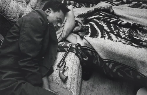 Sleeping Marcos by Jim Goldberg, photograph, 1989