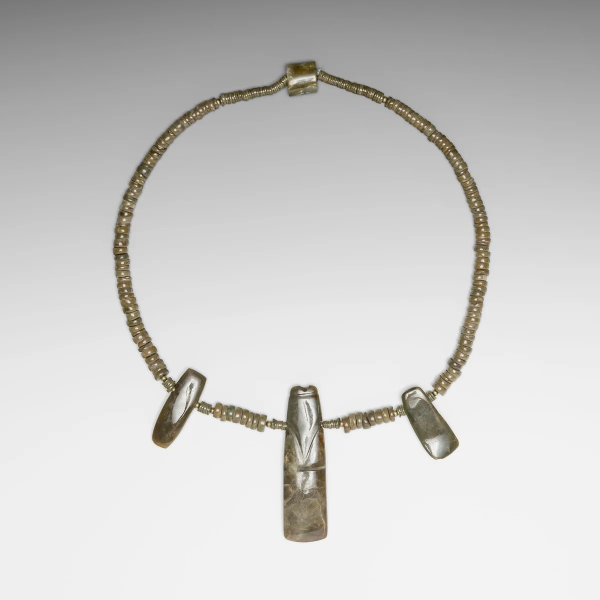 Beaded Necklace with Three Celt Pendants by Nicoya Nicoya, metalwork, 300-700