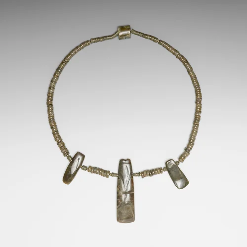 Beaded Necklace with Three Celt Pendants by Nicoya Nicoya, metalwork, 300-700