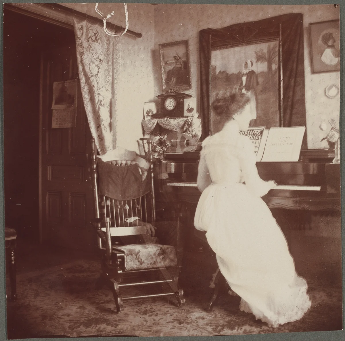Untitled (Woman at piano with male "ghost") by American 20th Century, photograph, 1890-1910