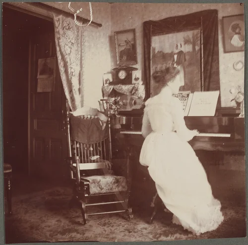 Untitled (Woman at piano with male "ghost") by American 20th Century, photograph, 1890-1910