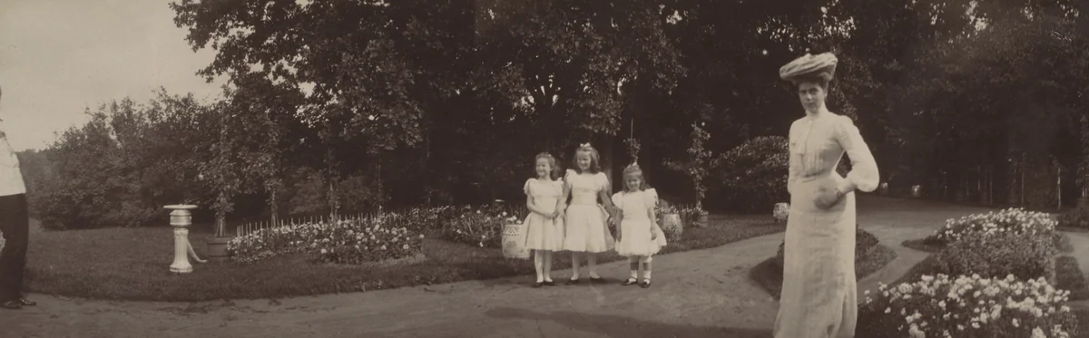 Grand Duke Alexander Mikhailovich At Far Left, Grand Duchess Xenia Alexandrovna At Right and Duchesses Tatiana, Olga and Maria in Garden, Peterhof by Unidentified Photographer, photograph, 1900