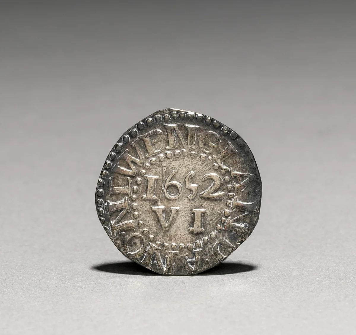 Pine Tree Sixpence (reverse) by John Hull, metalwork, 1652