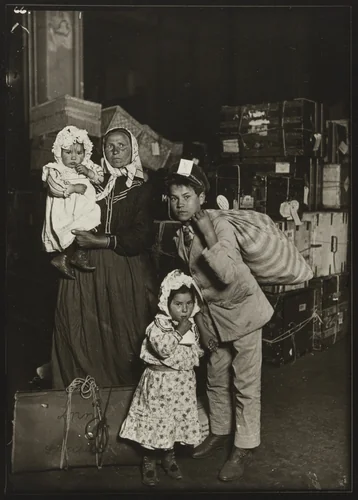 Italian Family Seeking Lost Baggage, Ellis Island by Lewis Wickes Hine, photograph, 1905