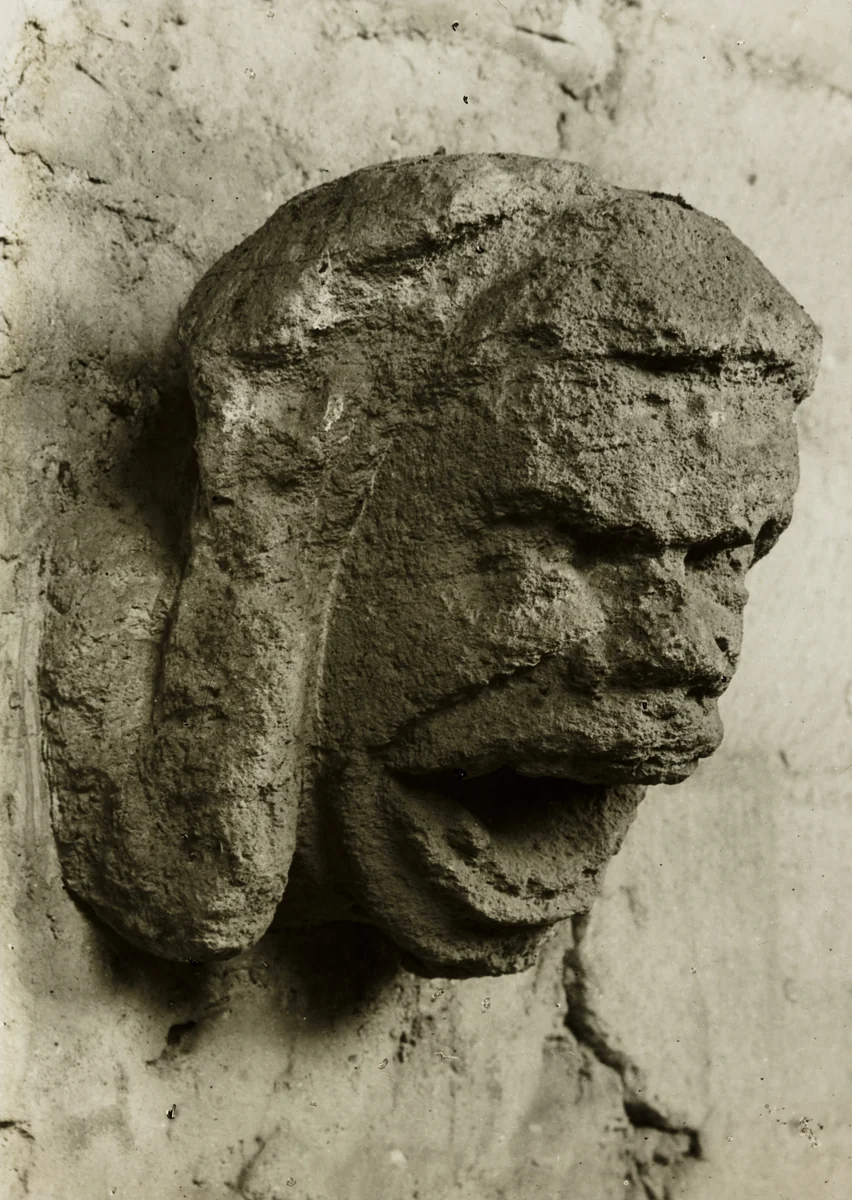 Ely Cathedral: Head in South Nave Triforium by Frederick Evans, photograph, 1886-1896