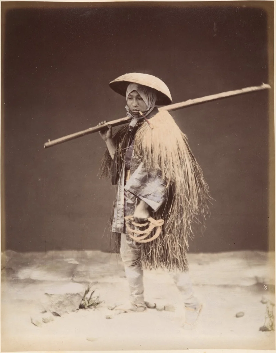 Farm laborer with rain coat (mino) by Suzuki Shin'ichi, photograph, 1870-1879