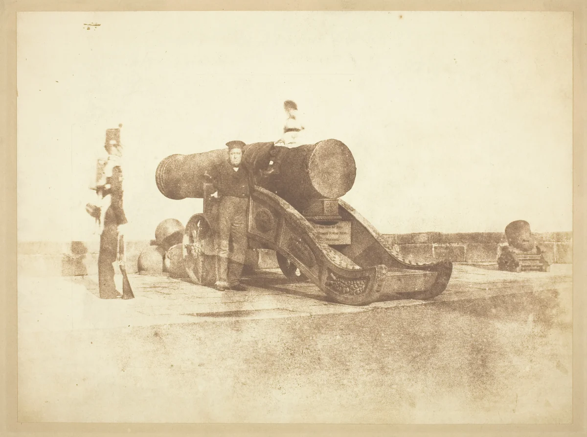 The cannon 'Mons Meg' at Edinburgh Castle, and a private in the 2nd battalion of Royal Scots who garrisoned the Castle in 1846 by David Octavius Hill and Robert Adamson, photograph, 1846