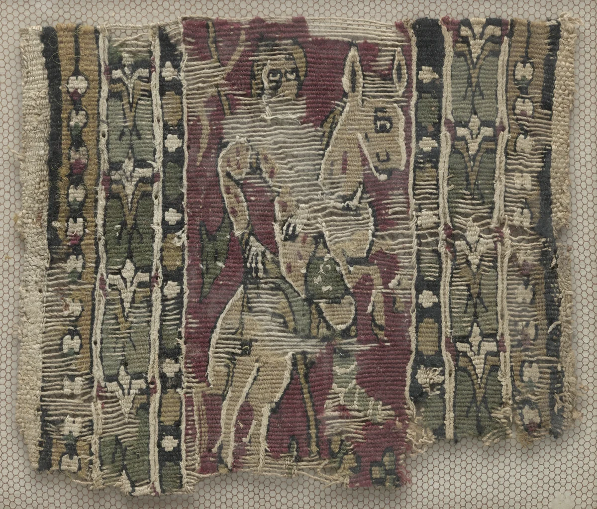 Fragment of a Clavus with Man on Horseback by Unknown, textile, 700-799