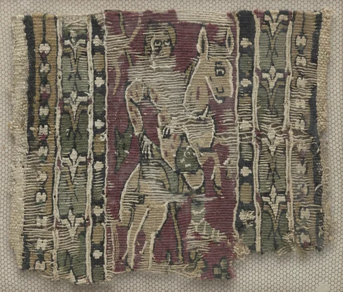 Fragment of a Clavus with Man on Horseback by Unknown, textile, 700-799