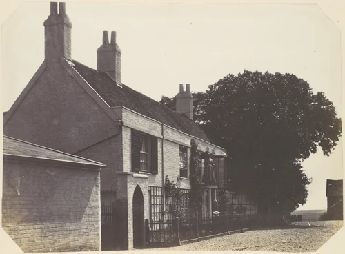 [House with Woman on Balcony, Man Standing Below] by Richard Dykes Alexander, photograph, 1855-1859
