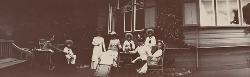 Grand Duke Alexander Mikhailovich, Duchess Xenia Aleksandrovna, Maria Feodorovna and Princess Irena at Garden Table, Peterhof by Unidentified Photographer, photograph, 1909