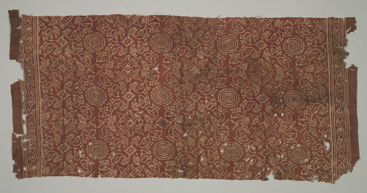 Fragment with geese circling lotus medallions by Unknown, textile, 1400-1499