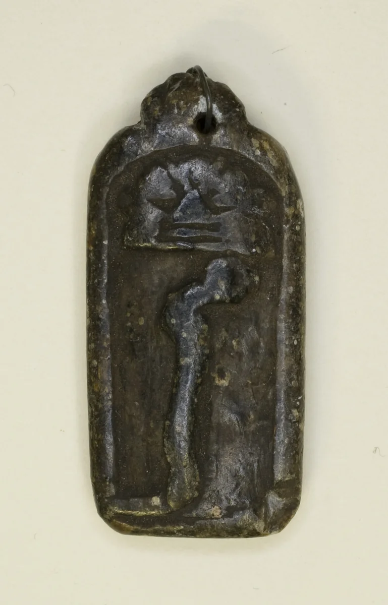 Amulet of Bes Head and Serpent by Egyptian, metalwork, -1070--664