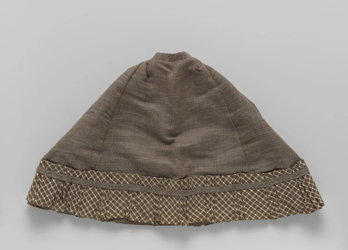 Rok van beige geruite wol met 7 zwarte knoopjes by anonymous, other, 1870-1880